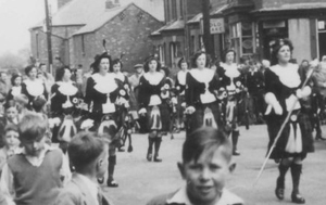 Dagenham Girl Pipers leading a parade